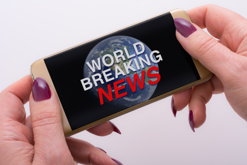 Phone showing how social media changed news through breaking news updates.