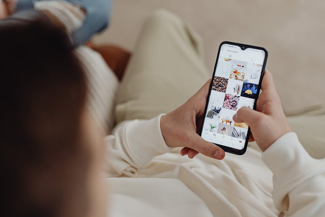 User browsing a social media feed showing why aesthetics go viral online.