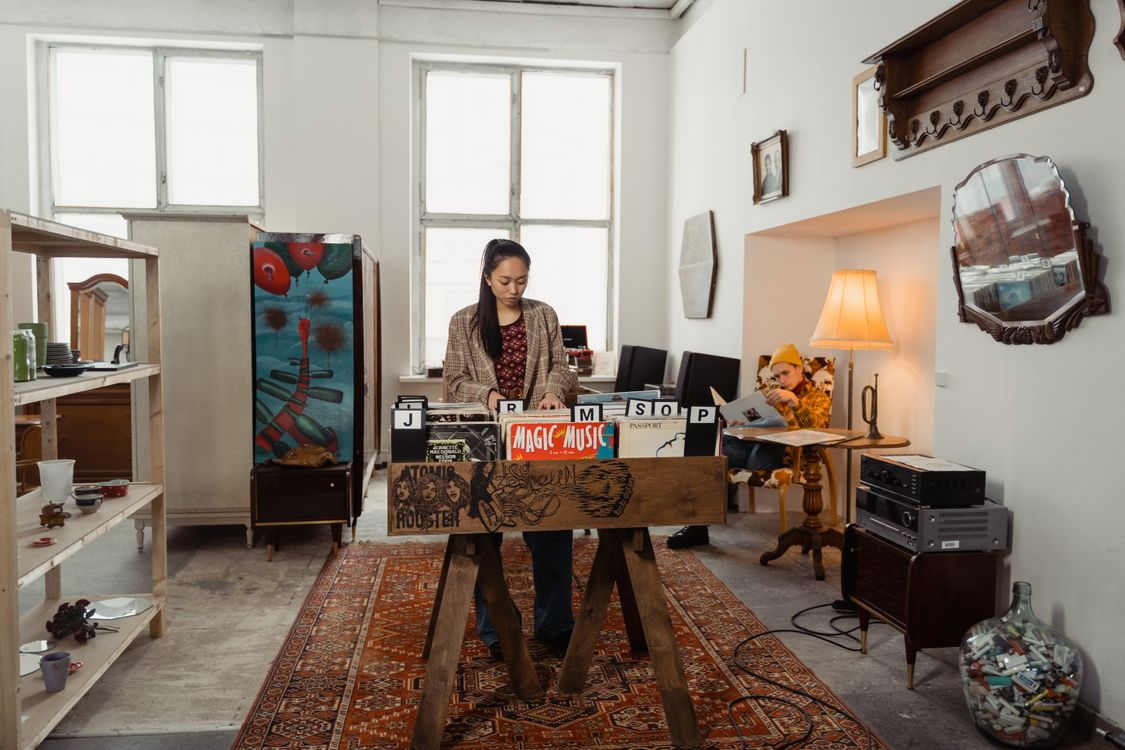 Shopper browsing vinyl records showing why nostalgia trends always return.